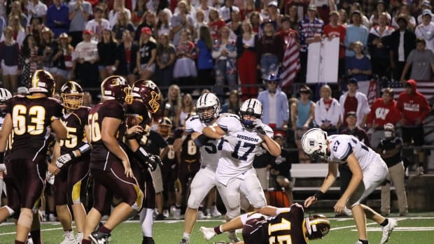 Hudson High School defensive end Will McDonald celebrates after a sack.